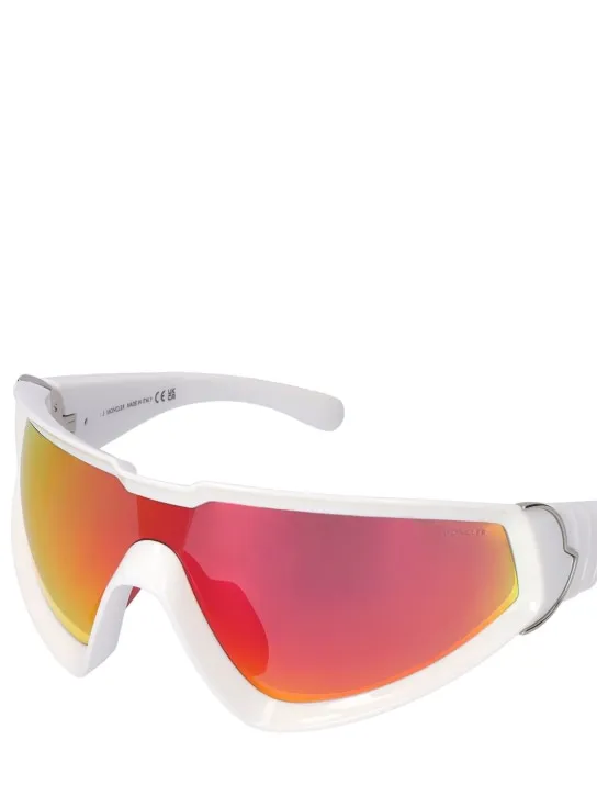 Moncler   Wrapid futuristic shape sunglasses 