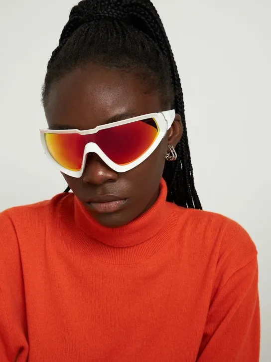 Moncler   Wrapid futuristic shape sunglasses 